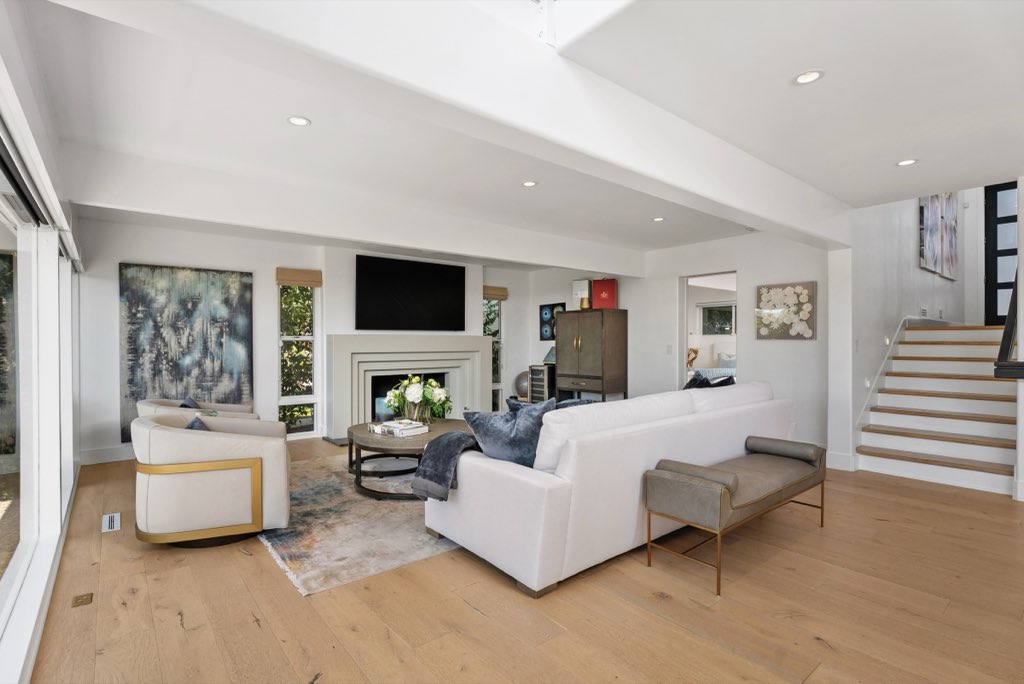 Bluff-top coastal home: Living room and stair